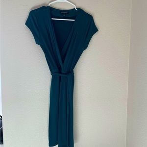 Rich teal faux wrap front dress.
